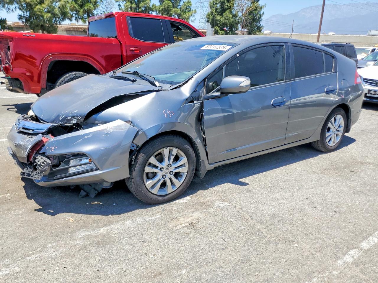 2013 Honda Insight EX, VIN JHMZE2H77DS003492 — Front end
