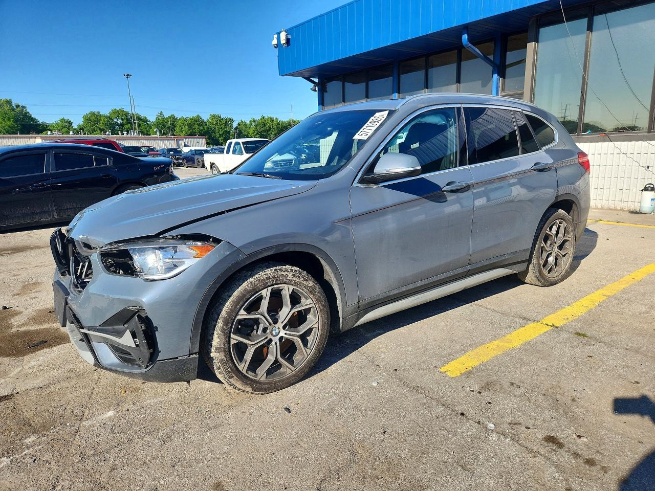2021 BMW X1 xDrive28i, VIN WBXJG9C07M3M76687 — Front end