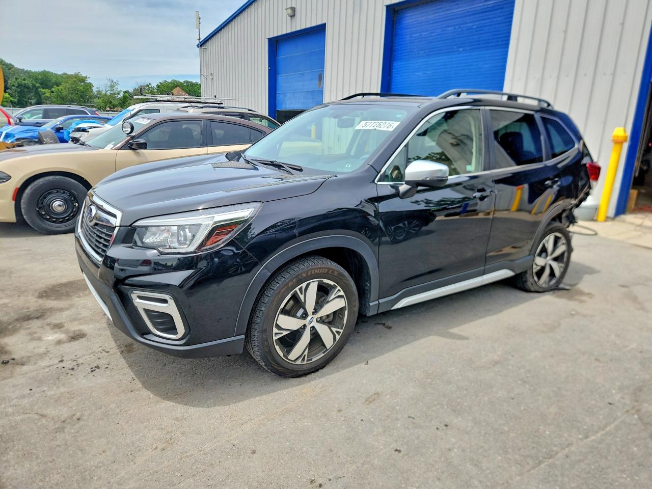 2020 Subaru Forester Touring, VIN JF2SKAXC8LH488419 — Rear end