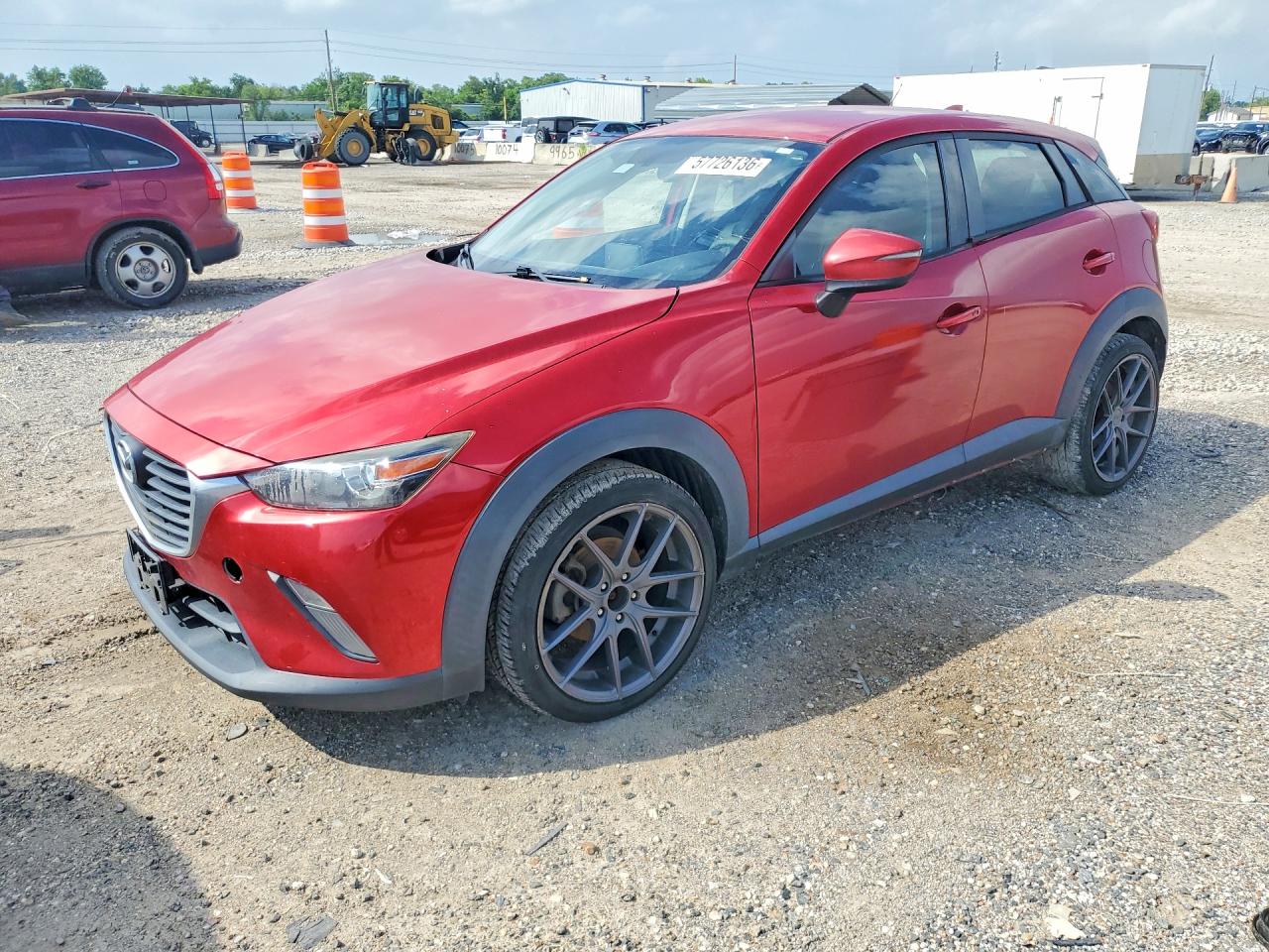 2017 Mazda CX-3 Touring, VIN JM1DKDC72H0147024 — Side