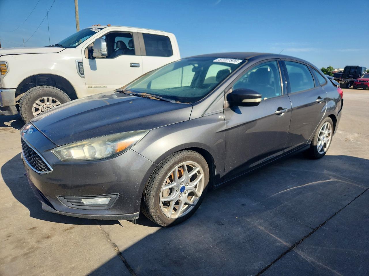 2015 Ford Focus SE, VIN 1FADP3F20FL227922 — Rear end