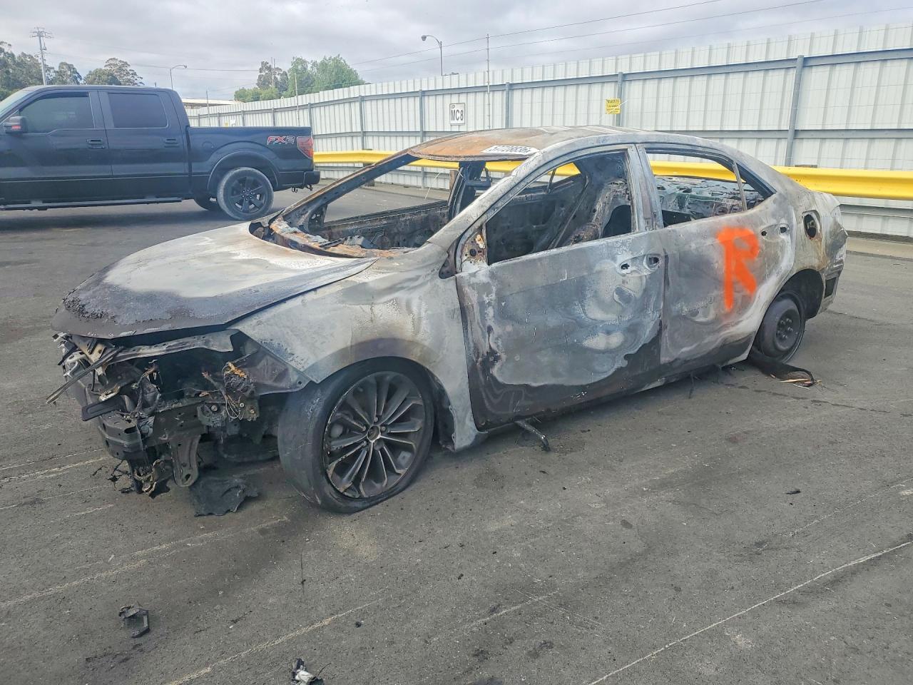 2014 Toyota Corolla S Plus, VIN 2T1BURHE1EC204627 — Burn