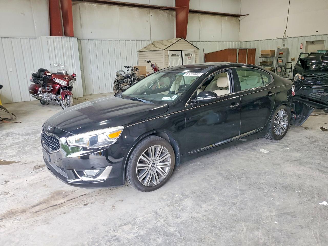 2016 Kia Cadenza, VIN KNALN4D77G5221053 — Rear end