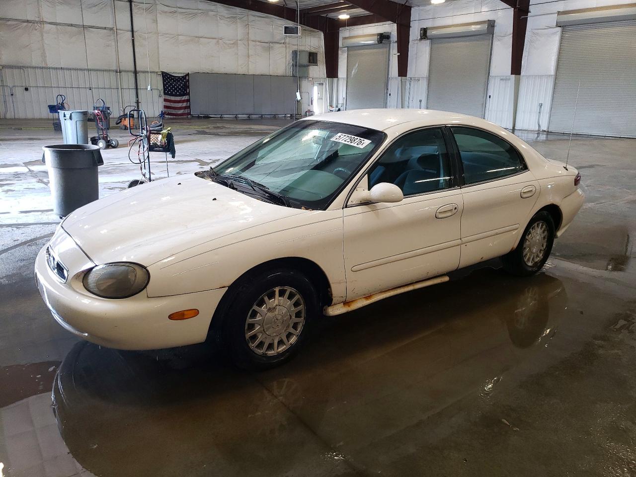 1999 Mercury Sable GS, VIN 1MEFM50U8XA623240 — Hail