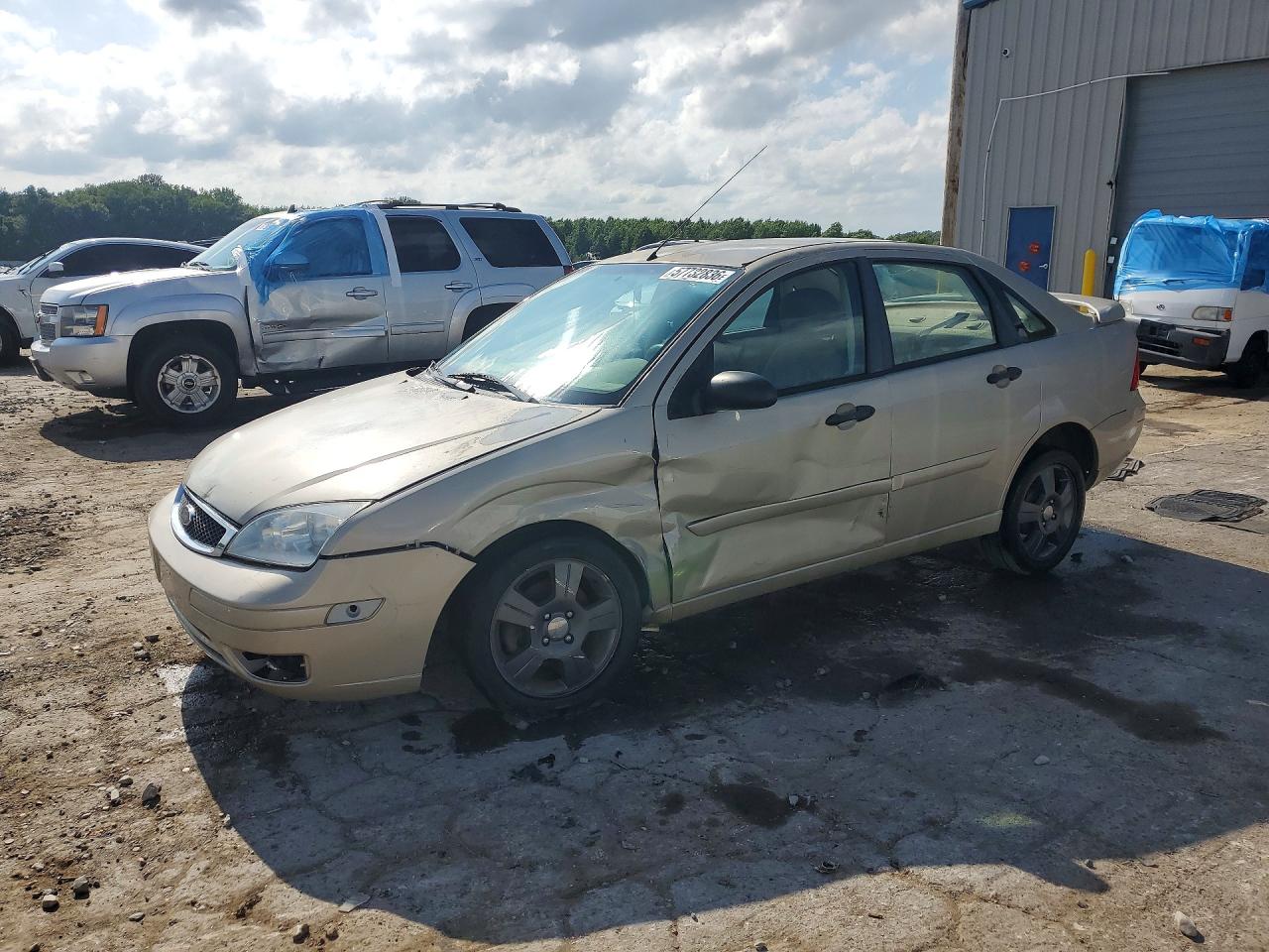 2006 Ford Focus S, VIN 1FAHP34N26W177800 — Side