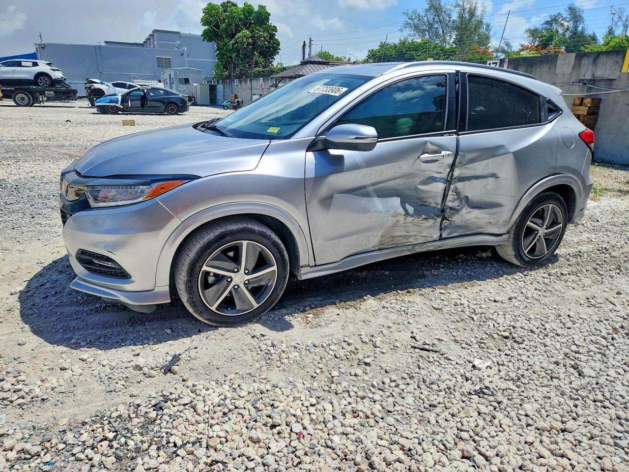 2020 Honda HR-V Touring, VIN 3CZRU6H9XLM715073 — Side