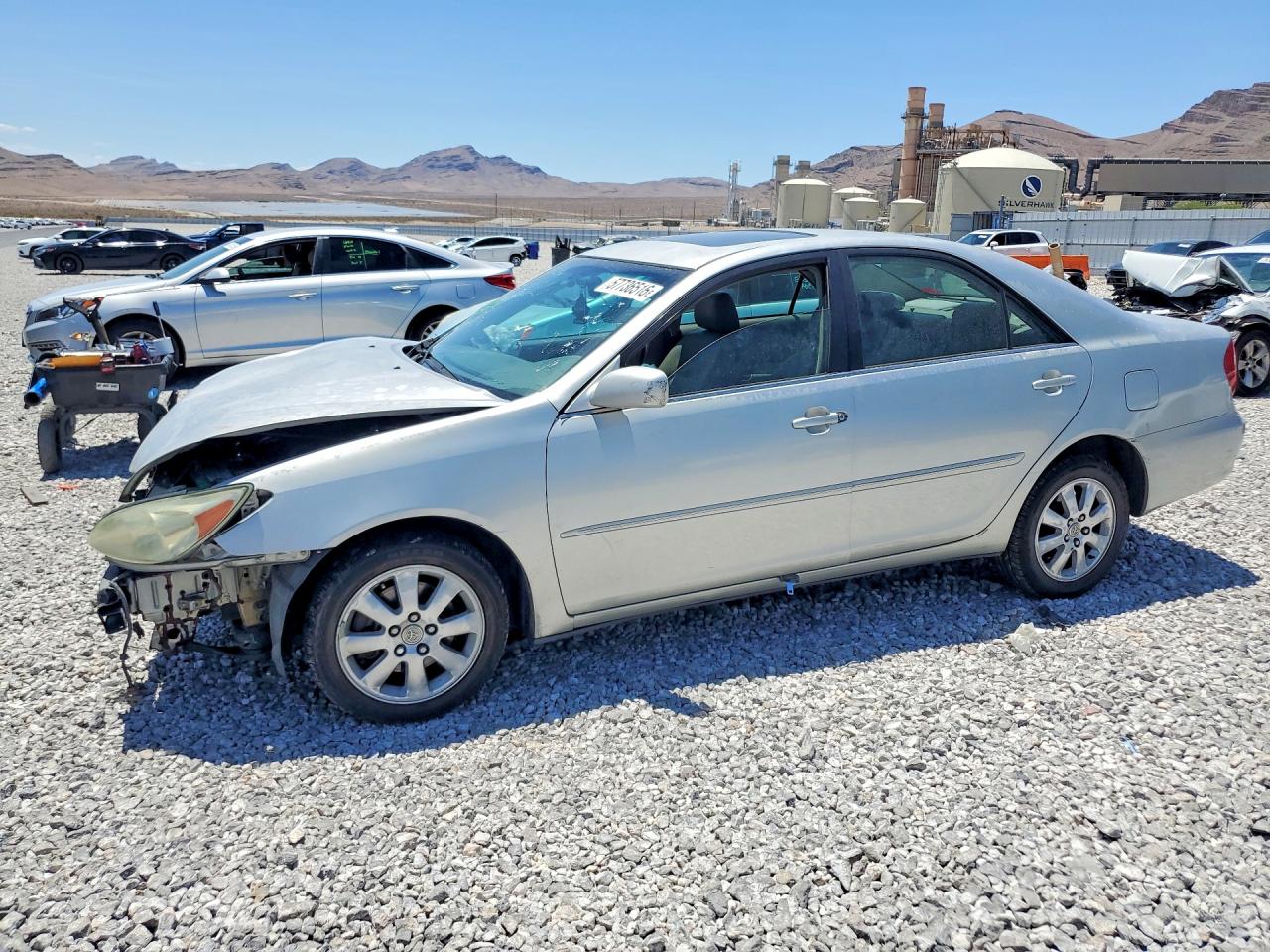 2003 Toyota Camry LE, VIN 4T1BF32K43U557767 — Front end