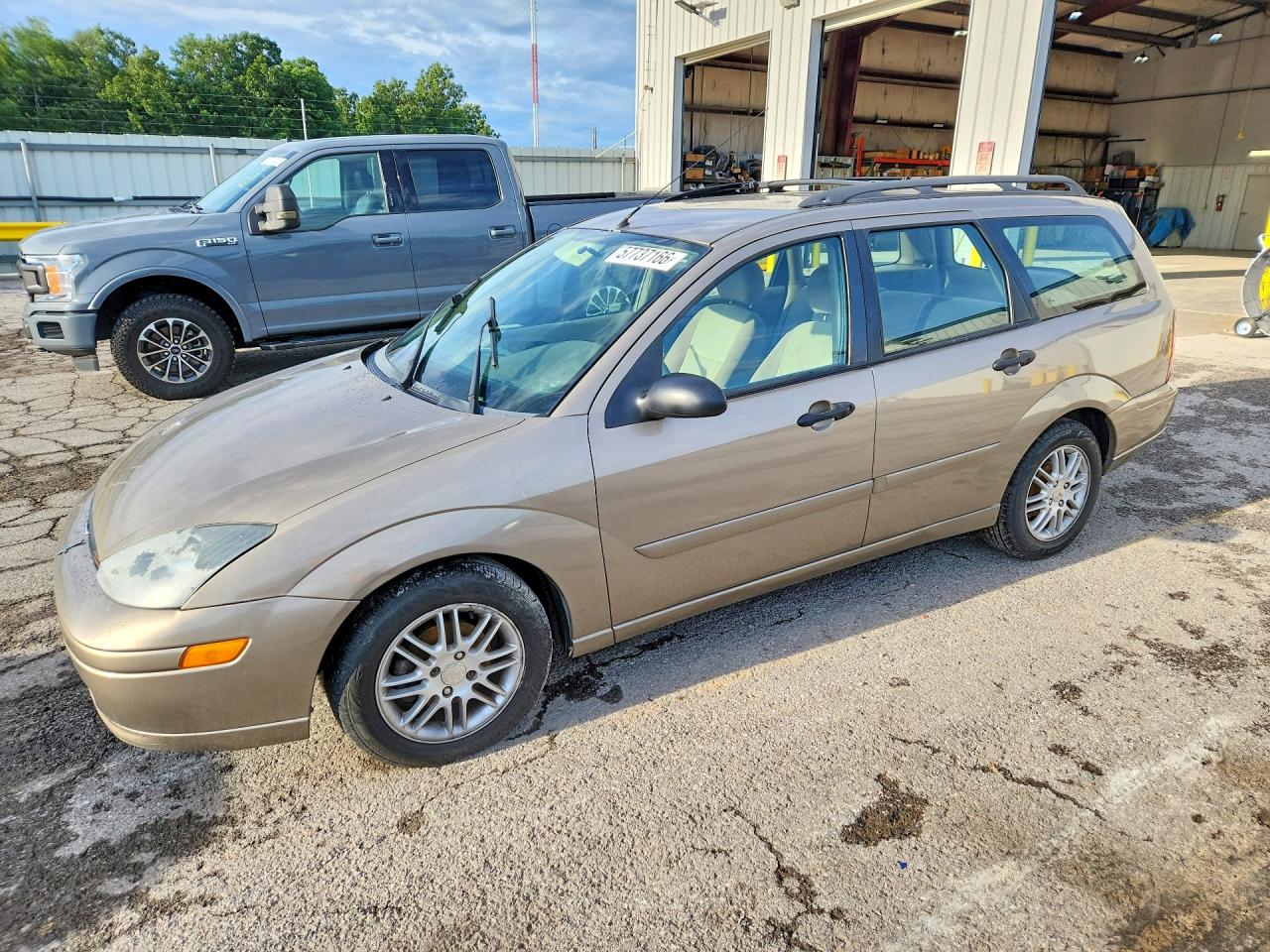 2004 Ford Focus ZTW, VIN 1FAFP35Z54W116561 — Вода / потоп