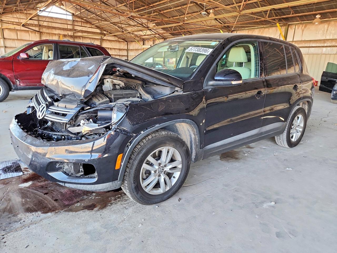 2012 Volkswagen Tiguan S, VIN WVGAV7AX9CW560722 — Front end