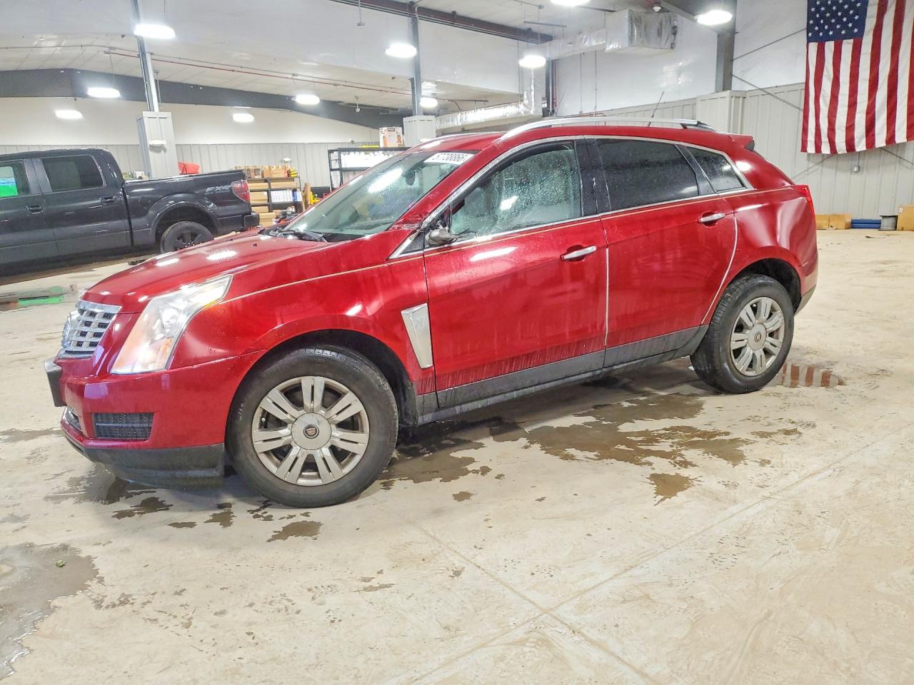 2014 Cadillac SRX Luxury Collection, VIN 3GYFNBE39ES609558 — Side