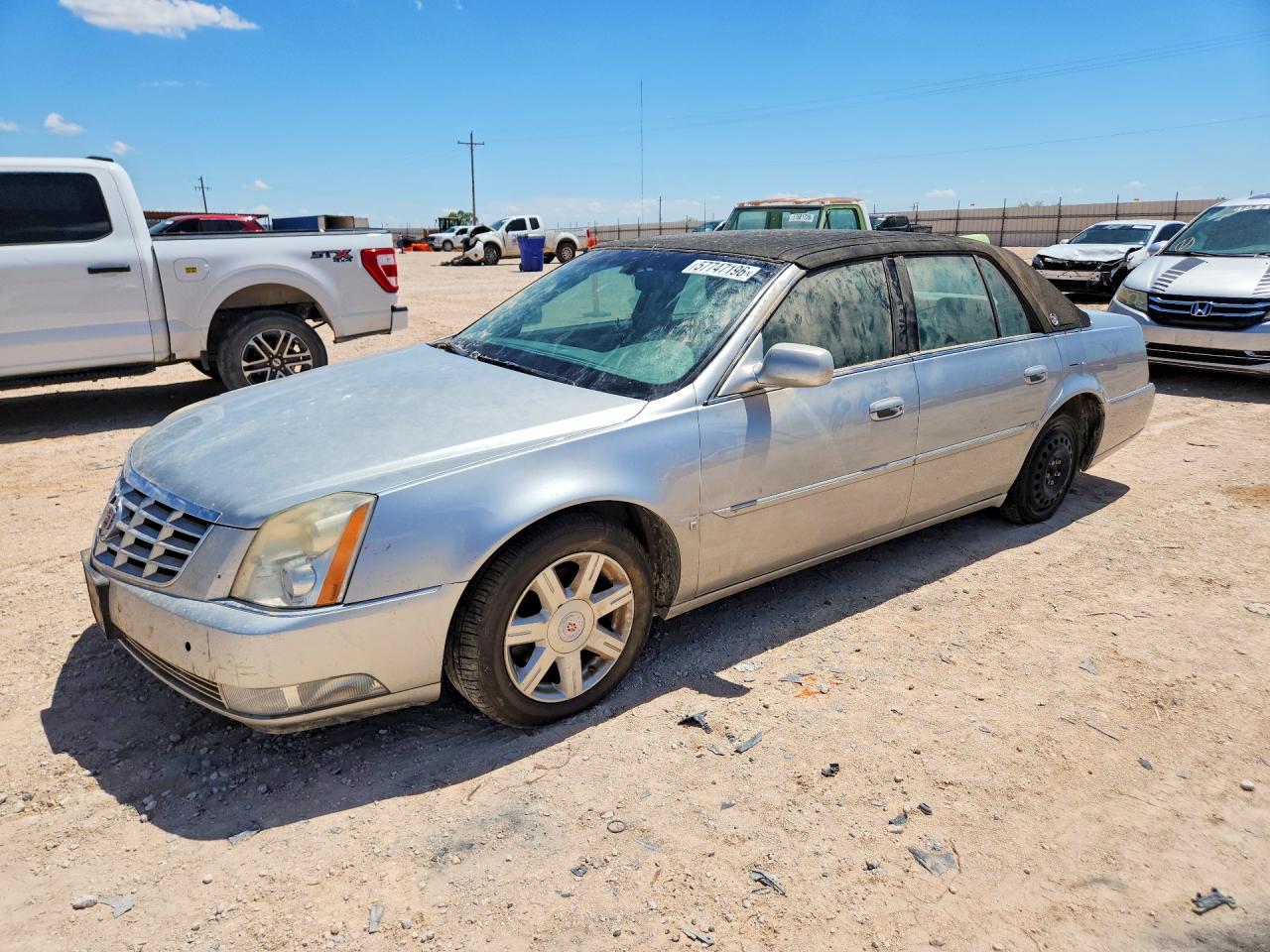 2007 Cadillac DTS Luxury I, VIN 1G6KD57Y67U224319 — Hail