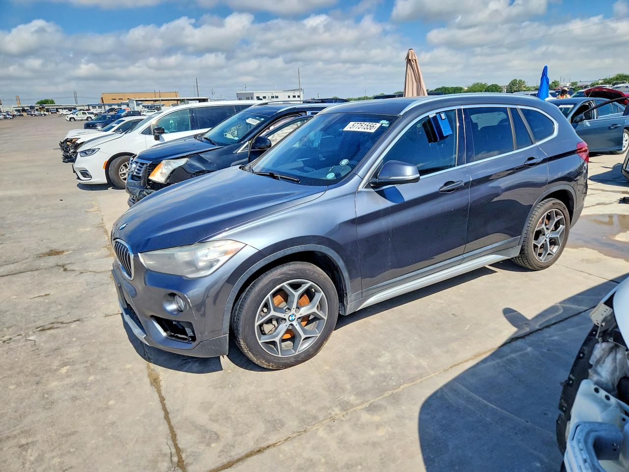 2018 BMW X1 sDrive28i, VIN WBXHU7C30J5L09402 — Normal wear