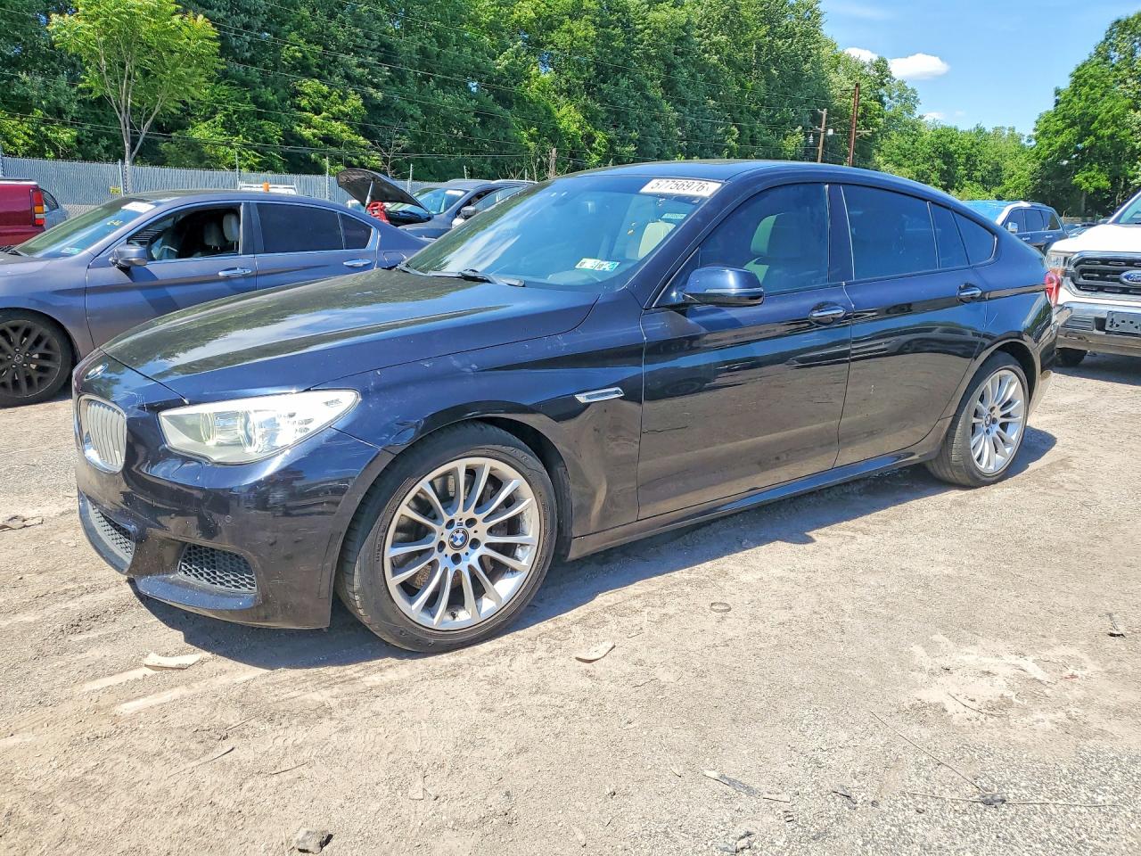 2014 BMW 5 Series 550i Gran Turismo xDrive, VIN WBA5M0C51ED084943 — Minor dents and scratches