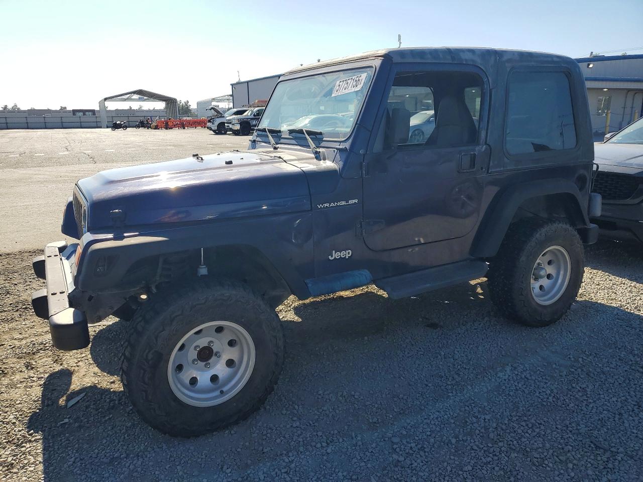 1999 Jeep Wrangler SE, VIN 1J4FY29P2XP472503 — Minor dents and scratches