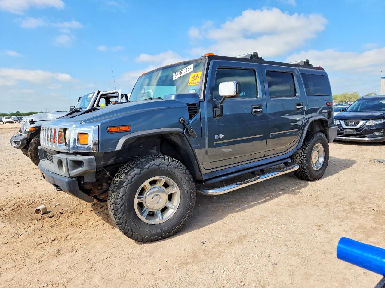 2005 Hummer H2 SUV, VIN 5GRGN23U55H122483 — Water / flood