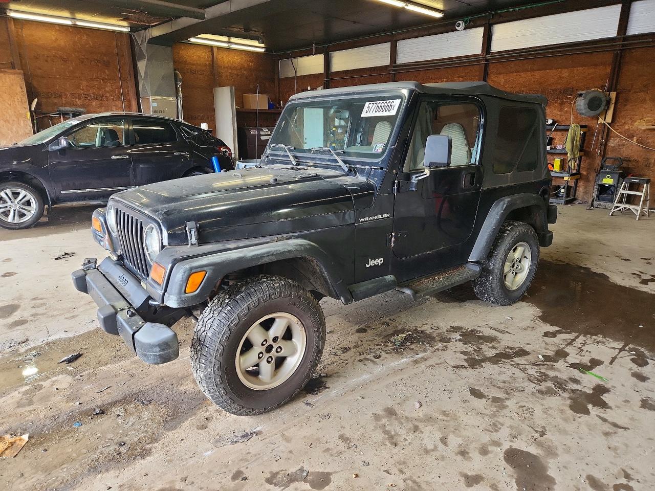 1999 Jeep Wrangler SE, VIN 1J4FY29P3XP466242 — Minor dents and scratches
