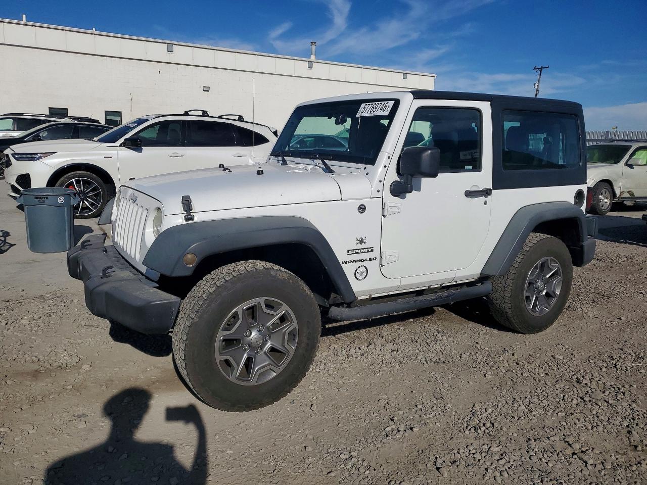 2012 Jeep Wrangler Sport, VIN 1C4AJWAG5CL190719 — Side