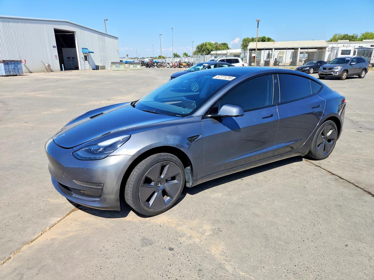 2023 Tesla Model 3, VIN 5YJ3E1EA5PF576975 — Rear end