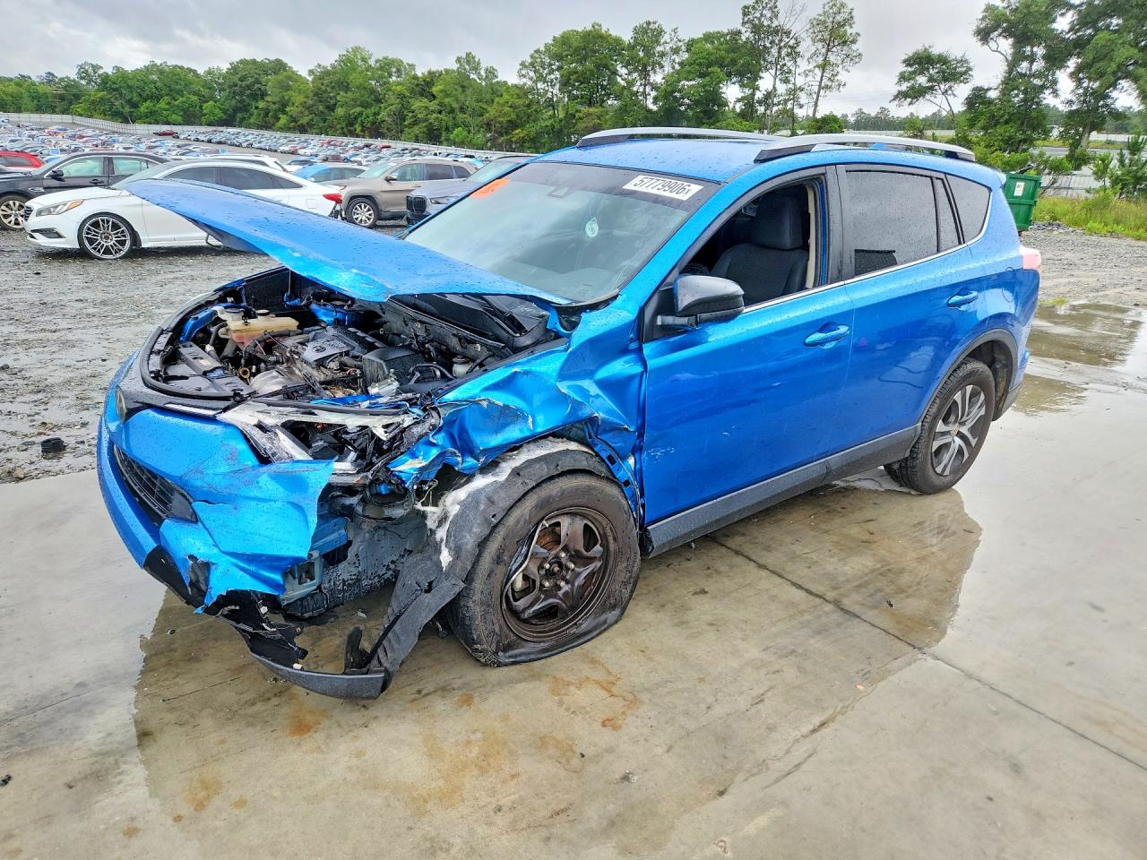 2018 Toyota RAV4 LE, VIN JTMZFREV1JJ748850 — Front end