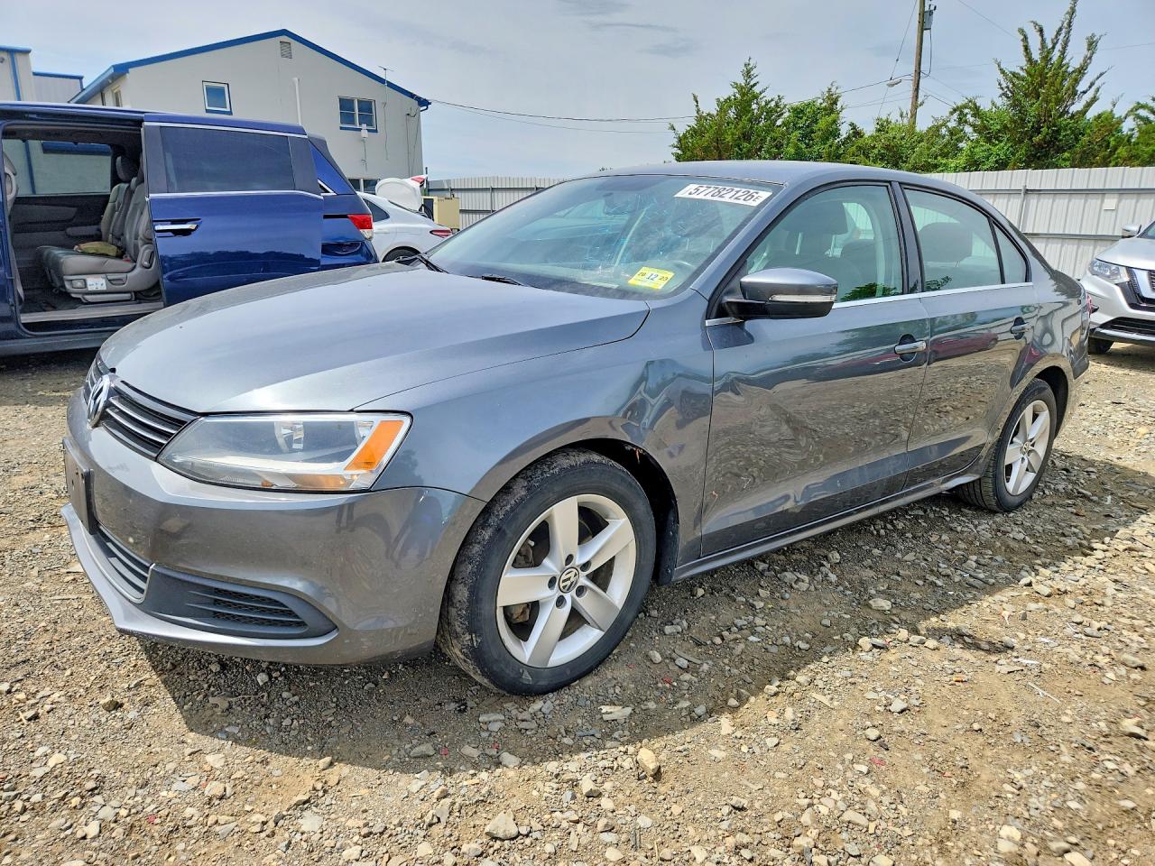 2014 Volkswagen Jetta TDI, VIN 3VWLL7AJ4EM303160 — Vandalism