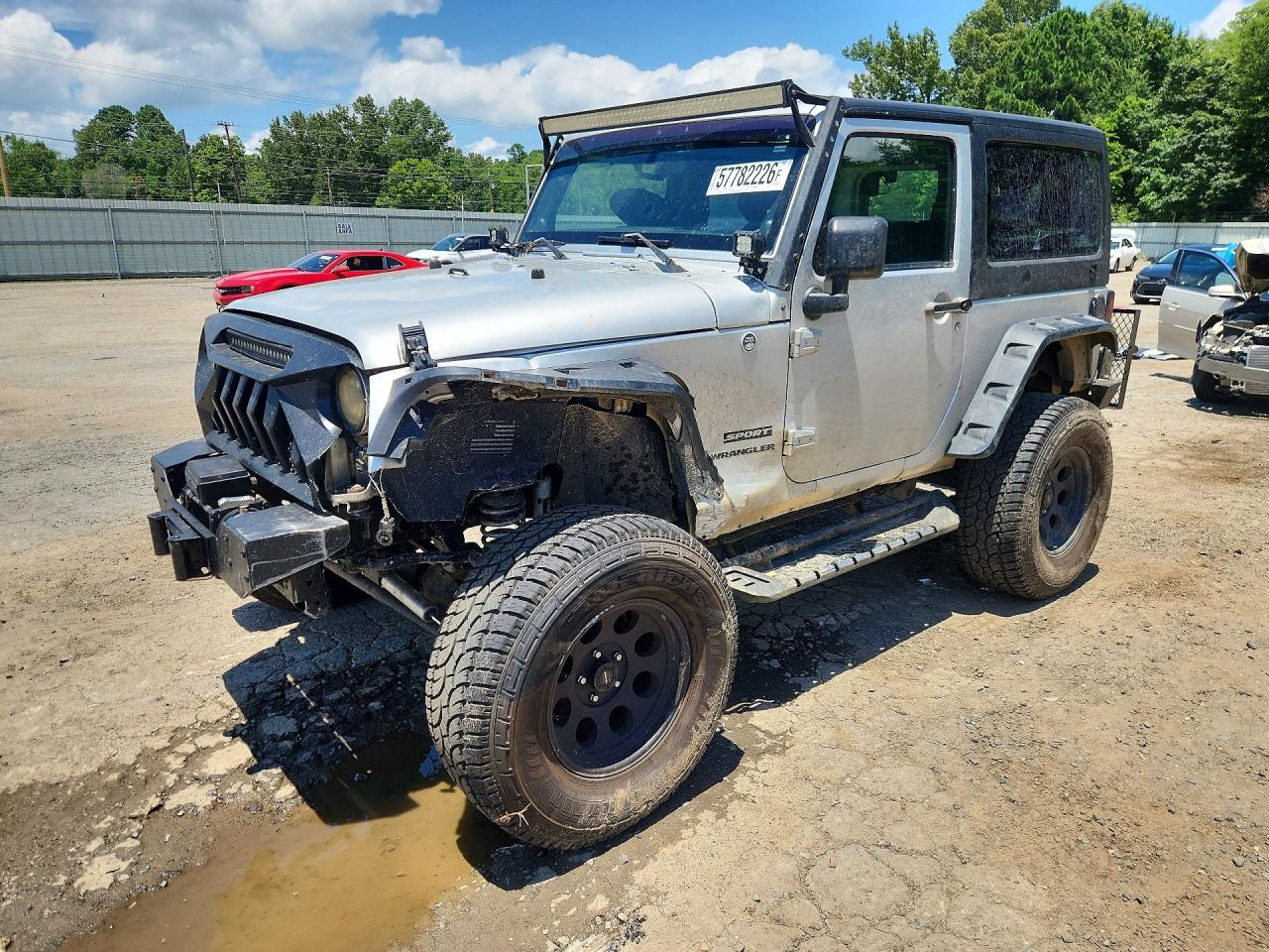 2012 Jeep Wrangler Sport, VIN 1C4AJWAG8CL149758 — Front end