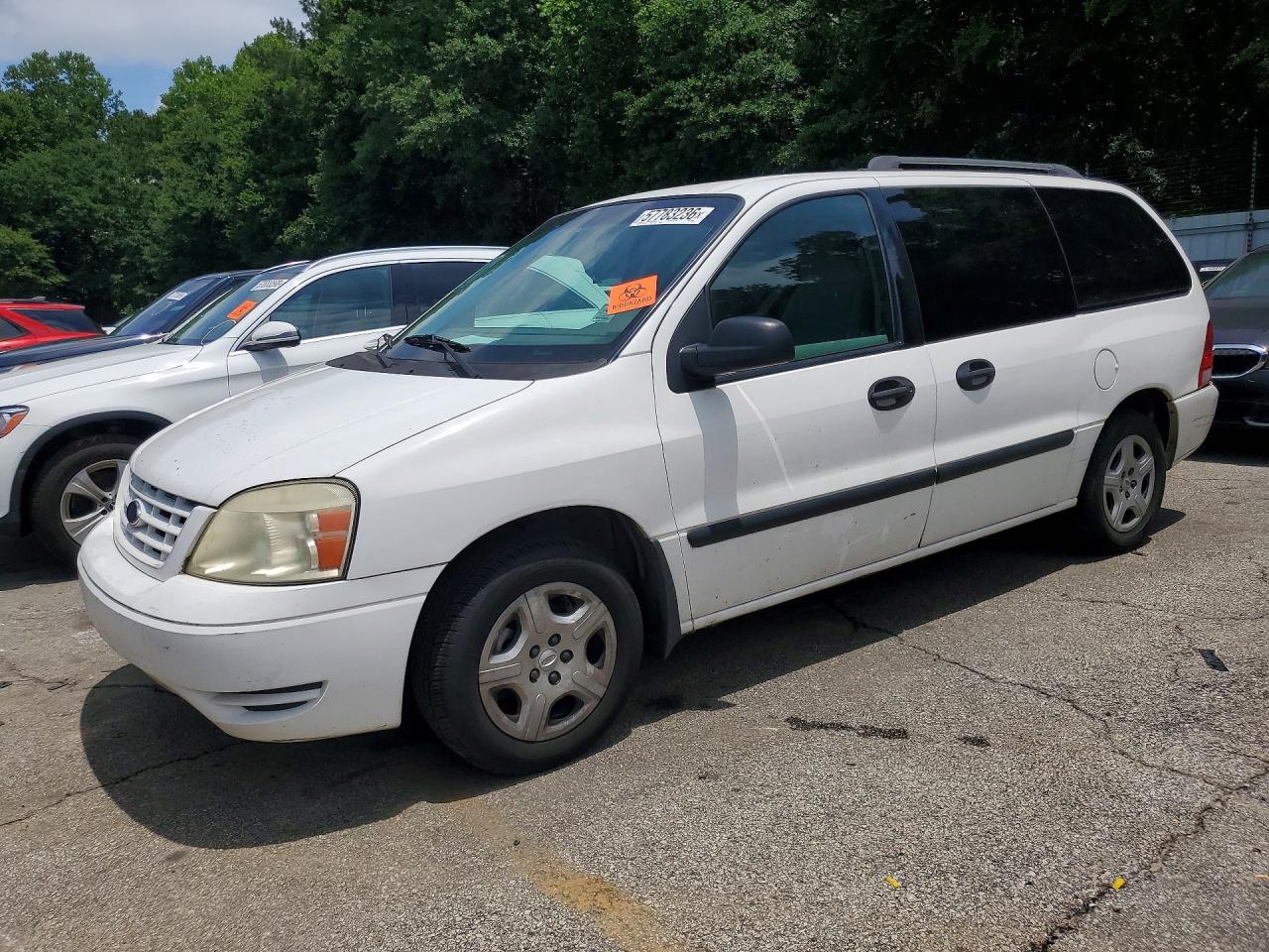 2006 Ford Freestar SE, VIN 2FMZA51616BA13962 — Side