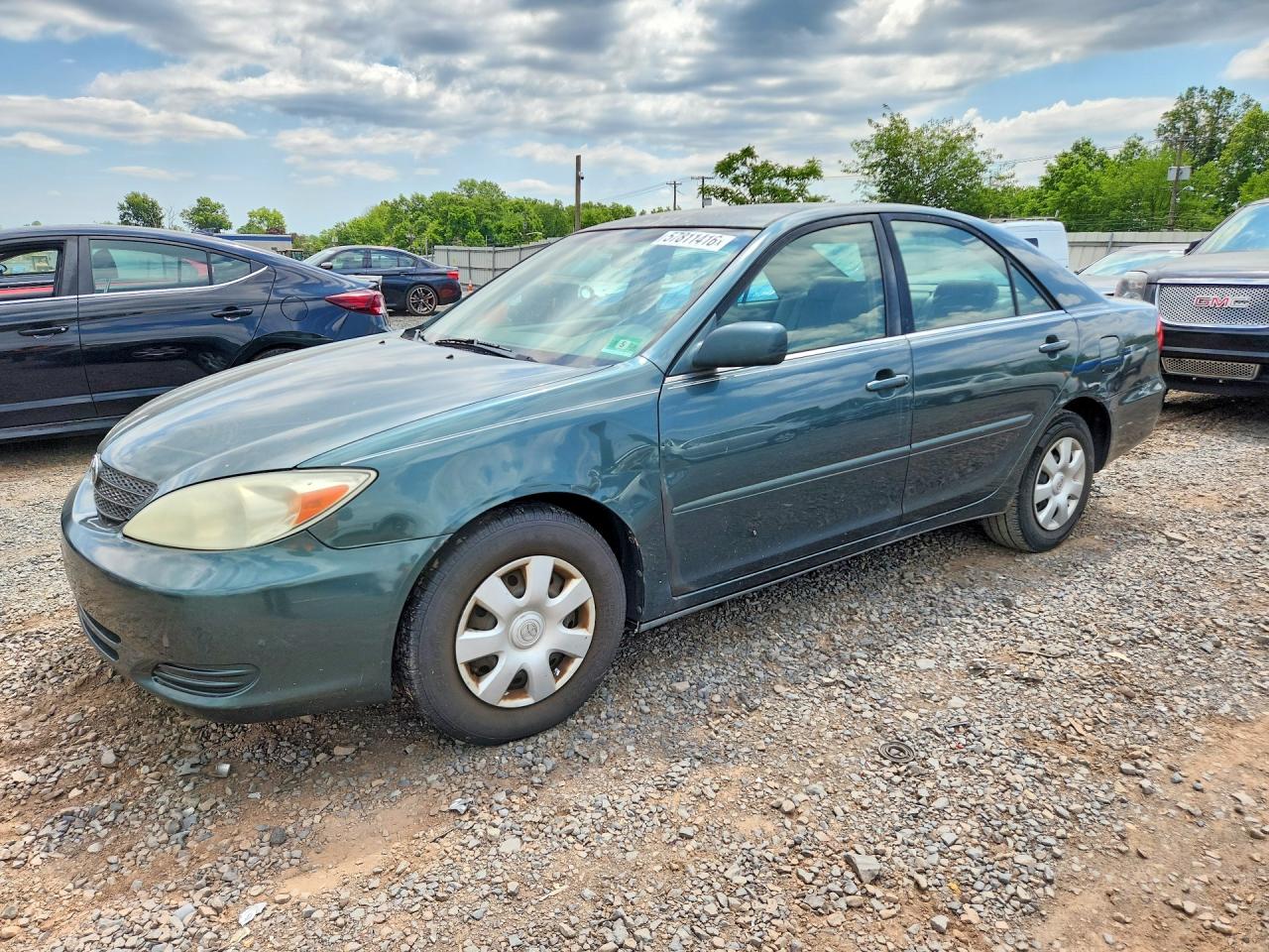 2002 Toyota Camry LE, VIN 4T1BE32K52U511088 — Rear end