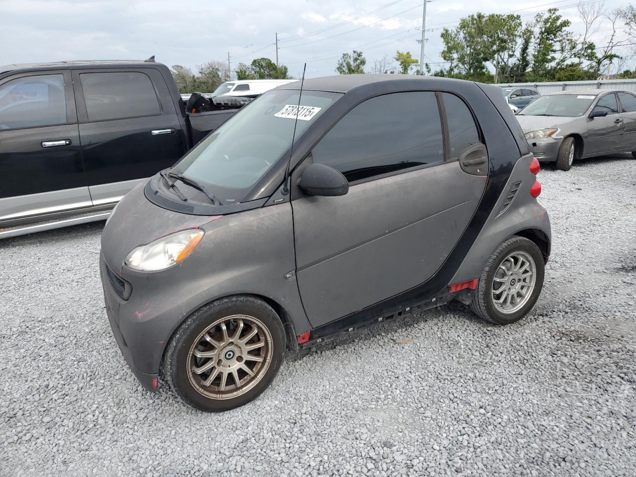 2012 Smart fortwo Pure, VIN WMEEJ3BA2CK519118 — Side
