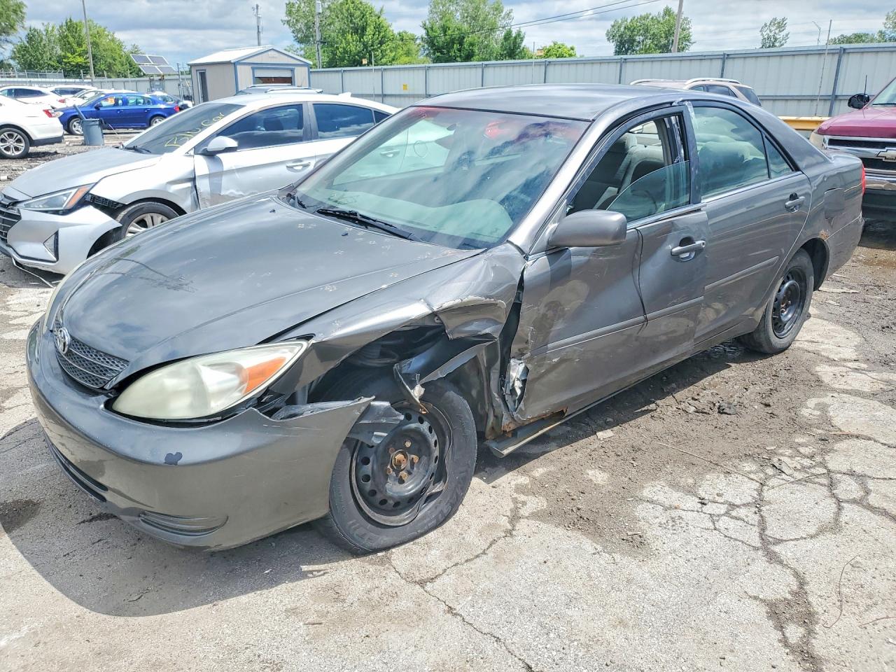 2003 Toyota Camry LE, VIN 4T1BE32K13U682440 — Side