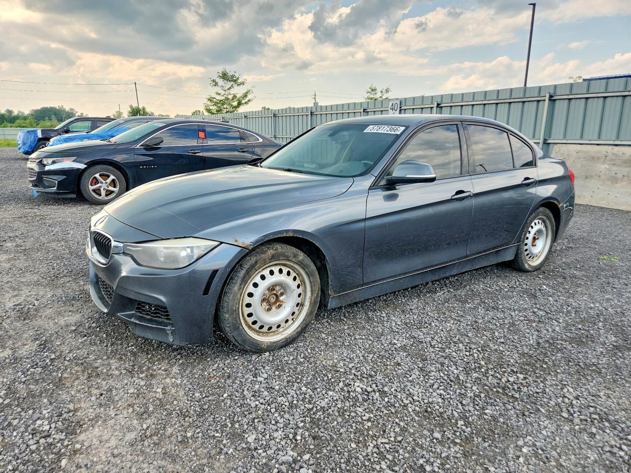 2013 BMW 3 Series 320i xDrive, VIN WBA3C3C51DF978746 — Side