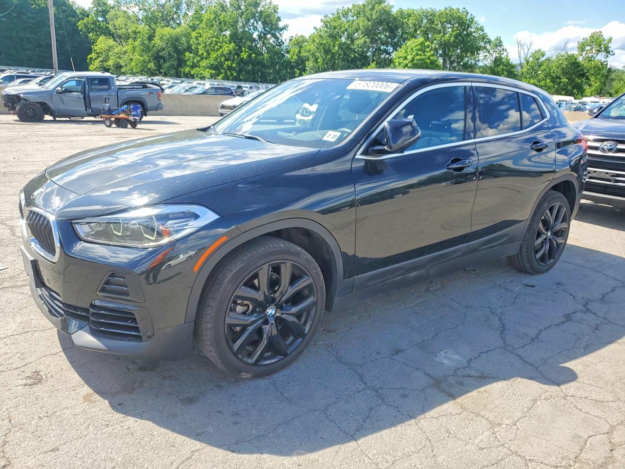 2022 BMW X2 xDrive28i, VIN WBXYJ1C05N5T78426 — Бок