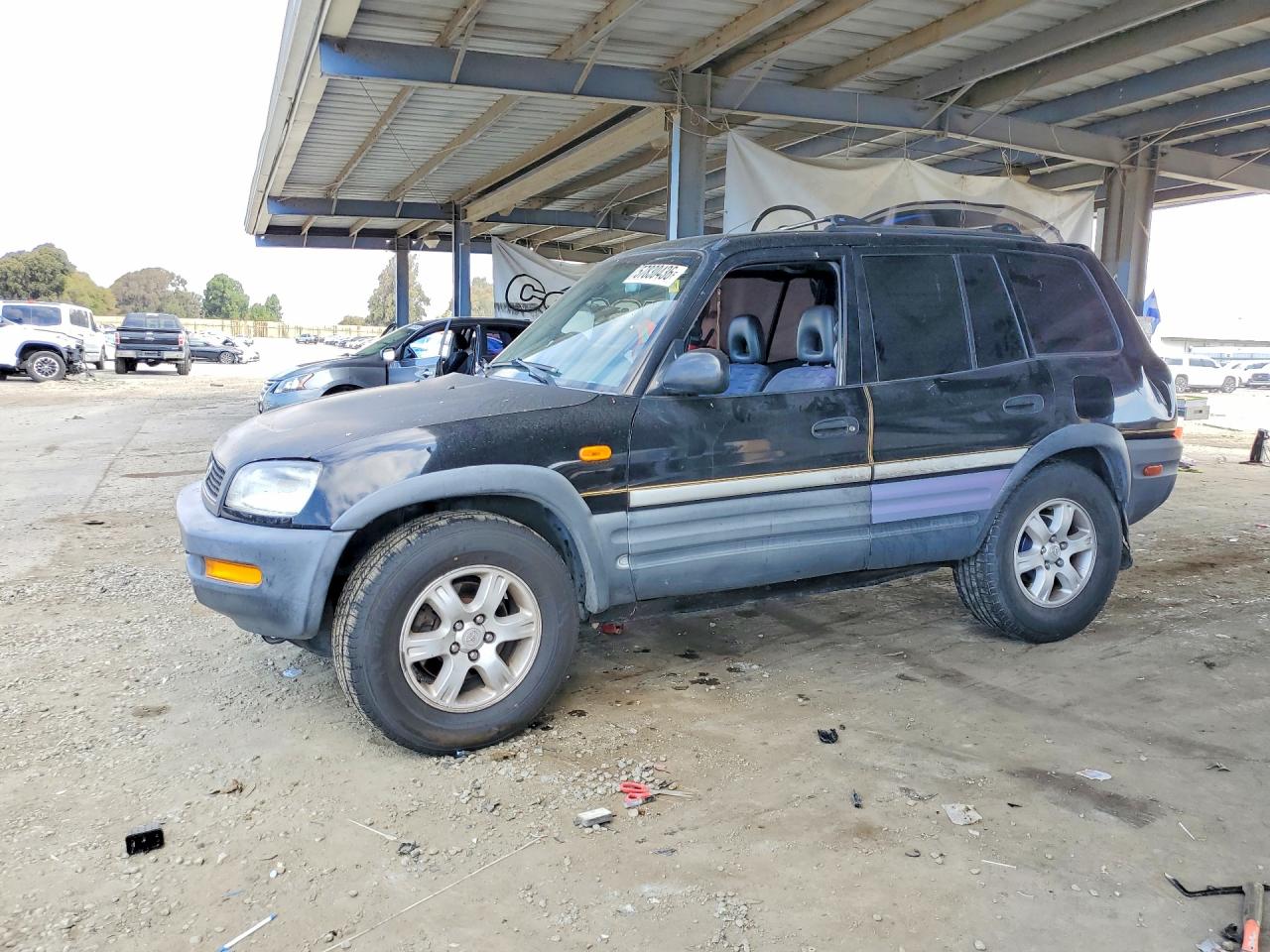 1997 Toyota RAV4, VIN JT3GP10V2V7016246 — Rear end