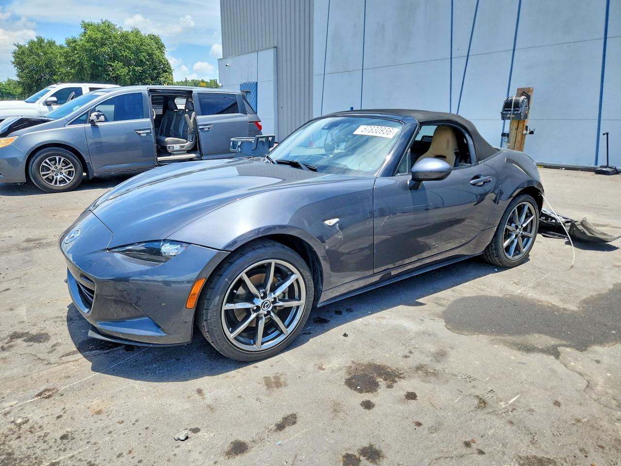 2016 Mazda MX-5 Miata Grand Touring, VIN JM1NDAD7XG0102309 — Side