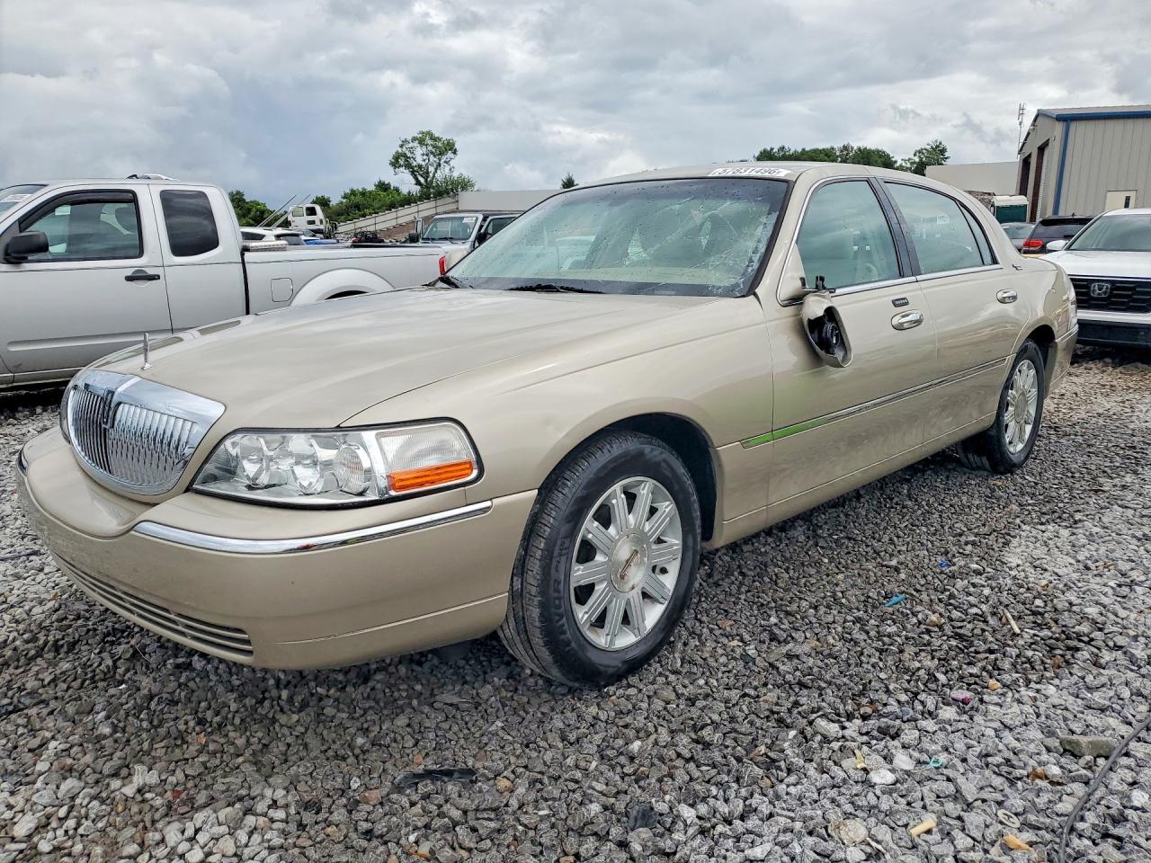 2011 Lincoln Town Car Signature Limited, VIN 2LNBL8CV7BX754860 — Hail