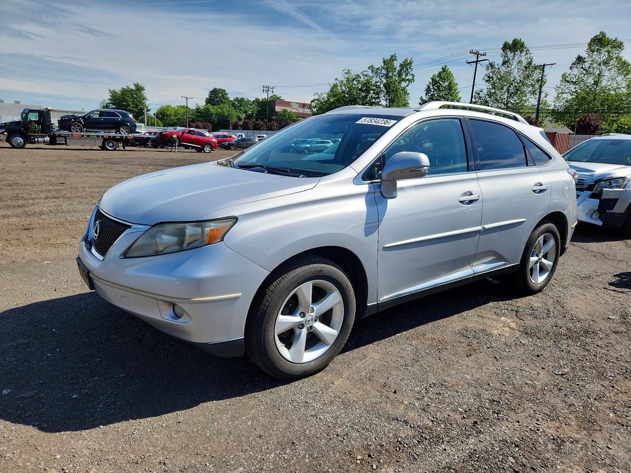 2010 Lexus RX 350, VIN 2T2BK1BA3AC066186 — Бок