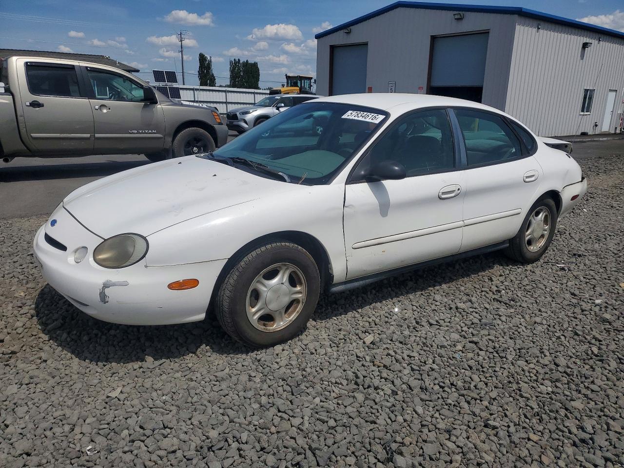 1997 Ford Taurus GL, VIN 1FALP52U1VA209227 — Rear end