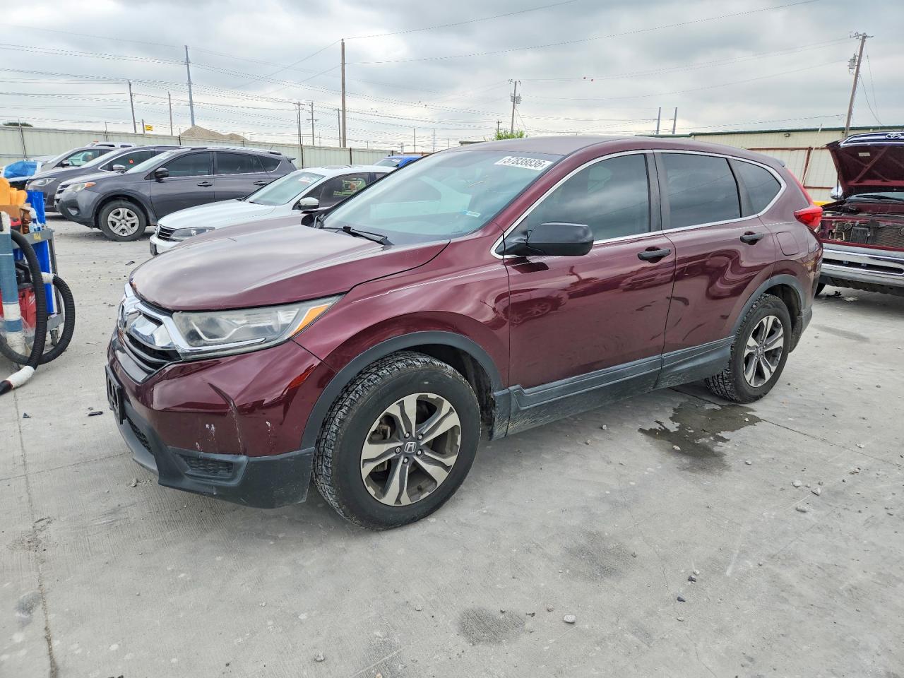 2019 Honda CR-V LX, VIN 2HKRW5H34KH415443 — Side