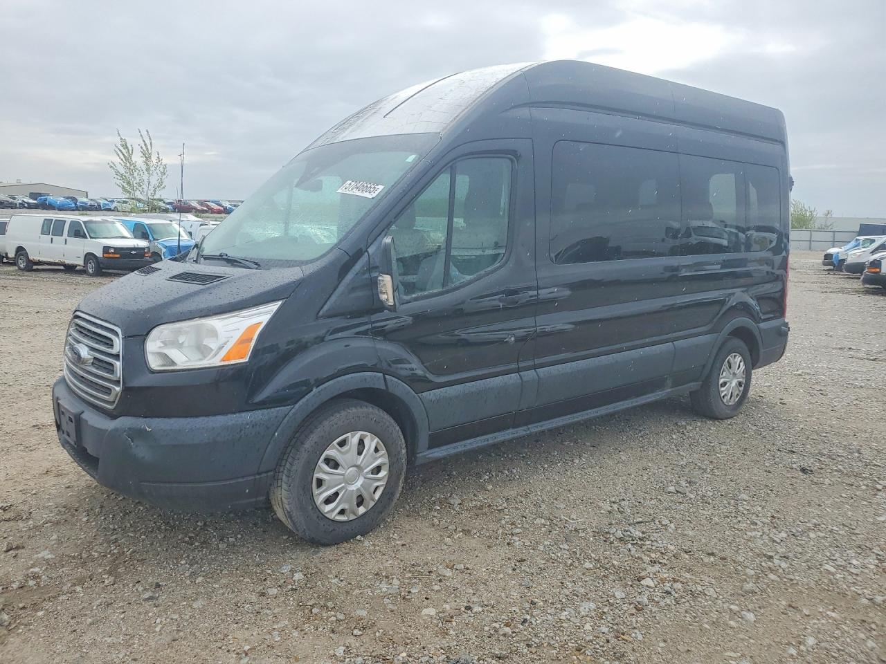 2017 Ford Transit Passenger XLT, VIN 1FBZX2XM2HKB26260 — Rear end