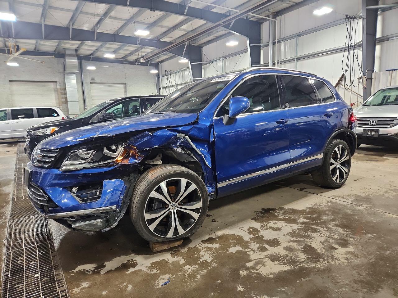 2017 Volkswagen Touareg Wolfsburg Edition, VIN WVGRF7BPXHD003982 — Rear end