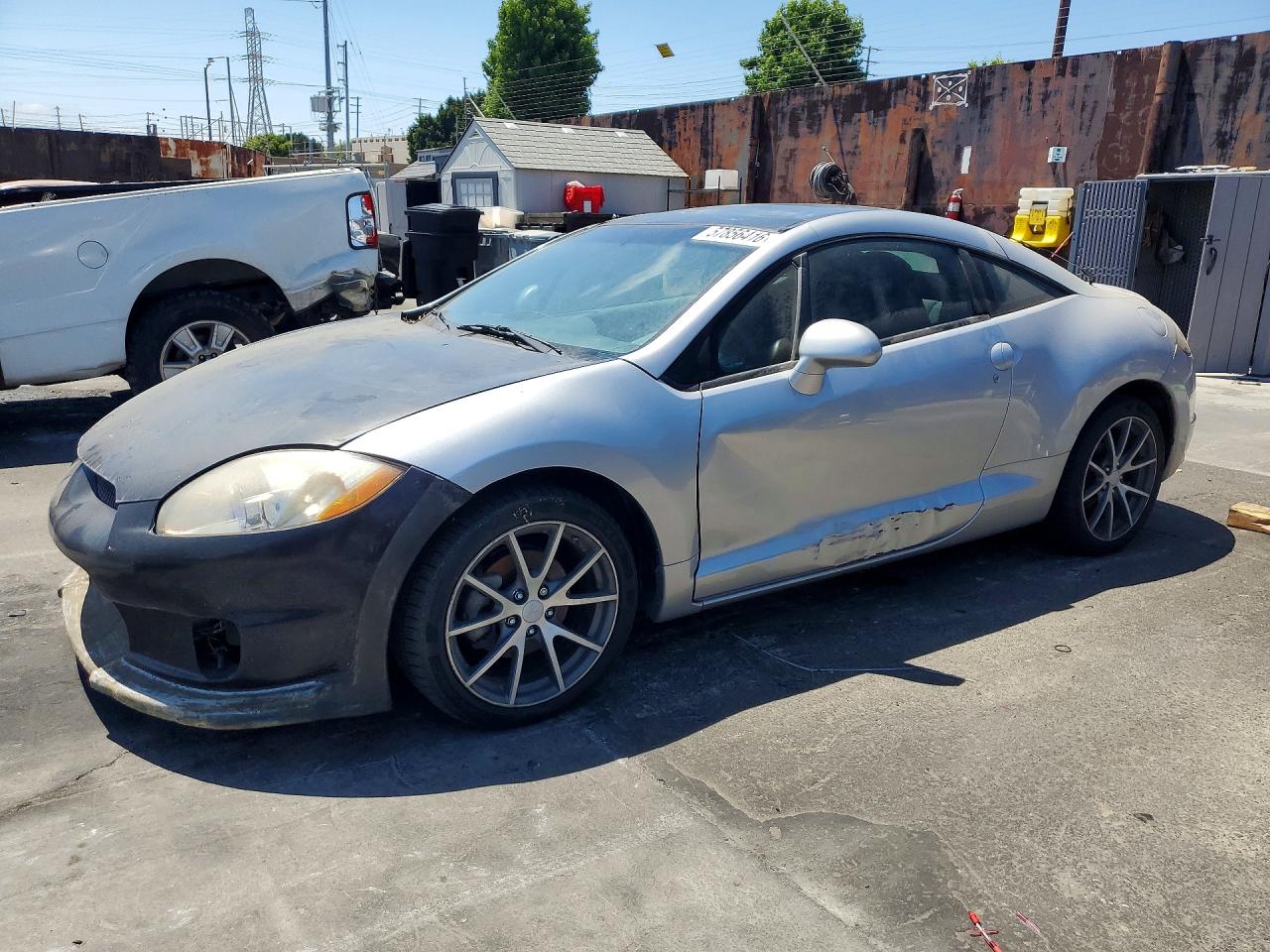 2012 Mitsubishi Eclipse GS, VIN 4A31K5DFXCE008587 — Side