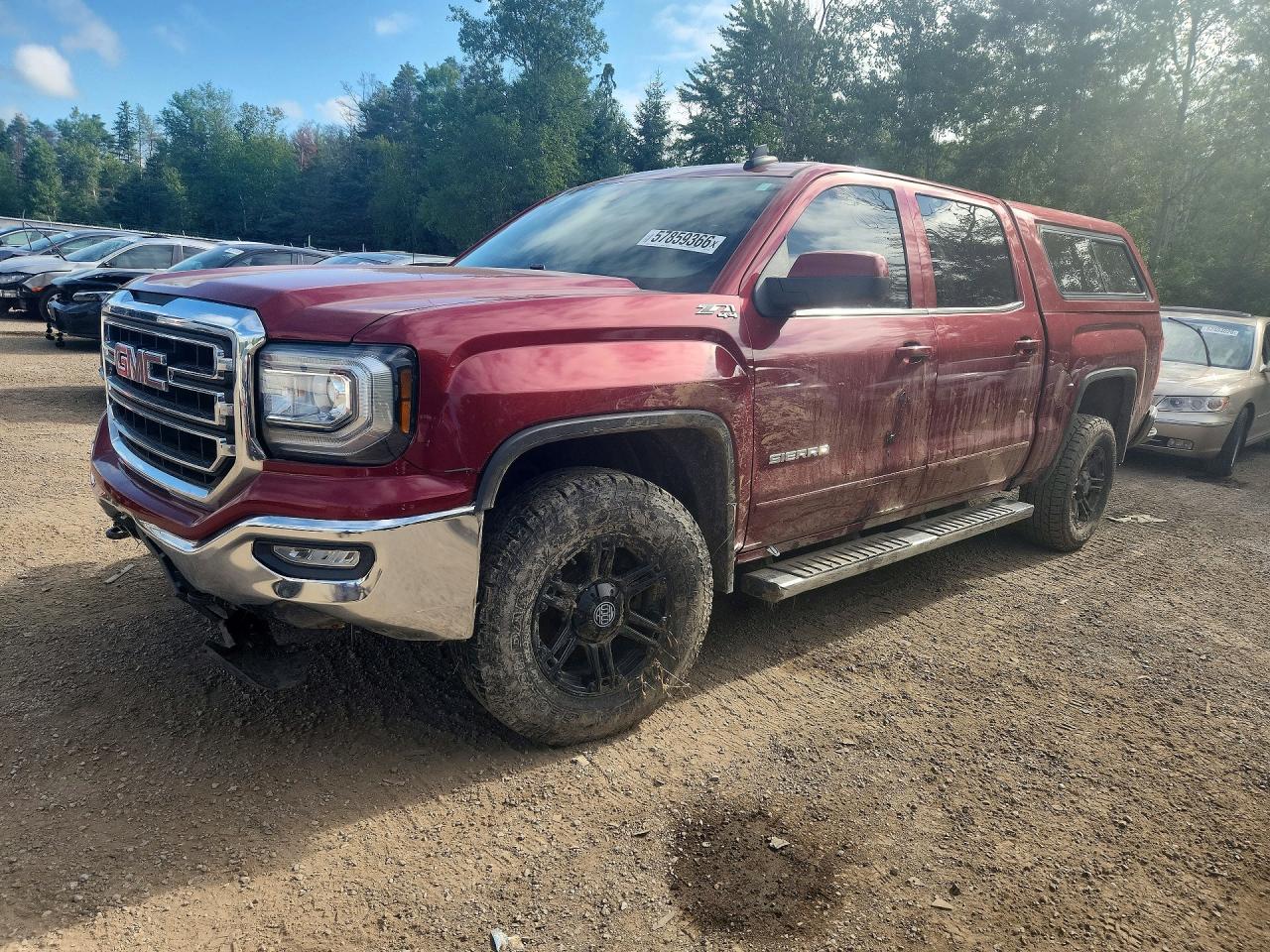 2018 GMC Sierra 1500 SLE, VIN 3GTU2MECXJG257489 — Undercarriage