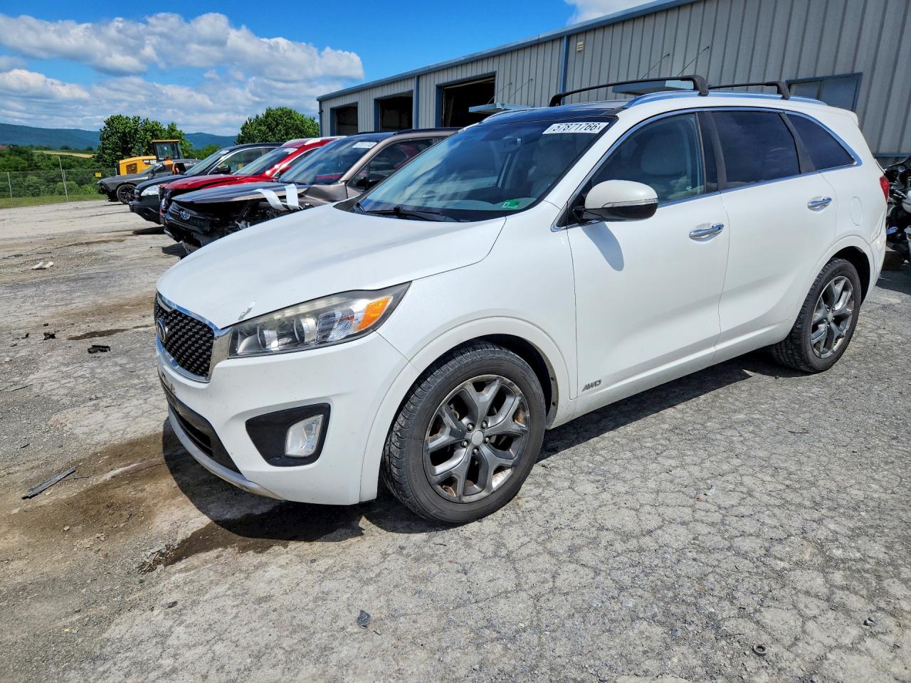 2016 Kia Sorento SX, VIN 5XYPKDA5XGG129524 — Rear end
