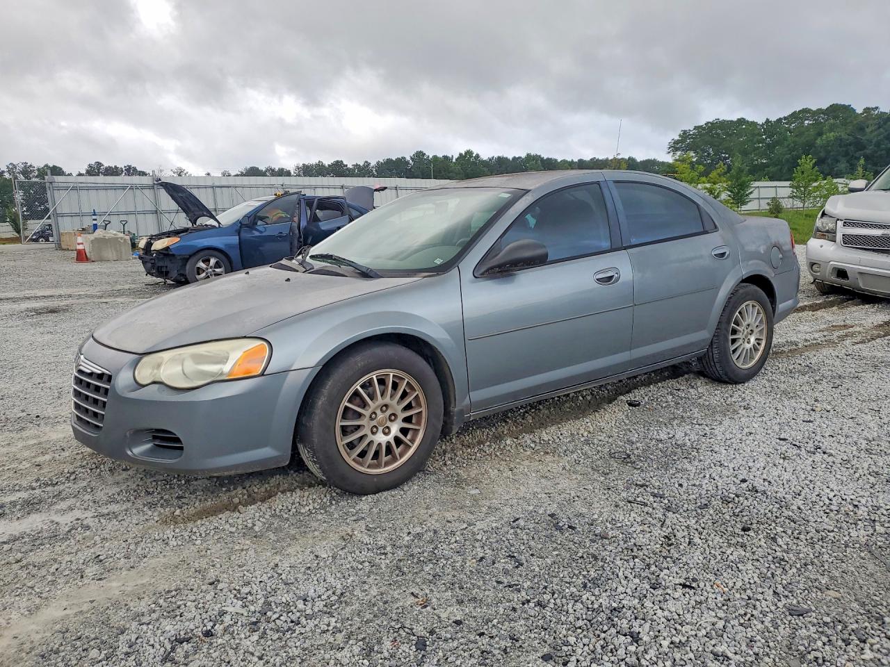 2006 Chrysler Sebring Touring, VIN 1C3EL56R66N210988 — Бок