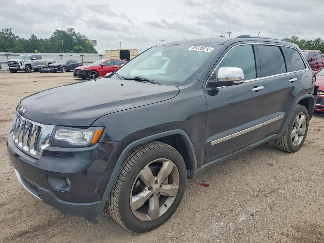 2013 Jeep Grand Cherokee Overland Summit, VIN 1C4RJECGXDC526344 — Rear end