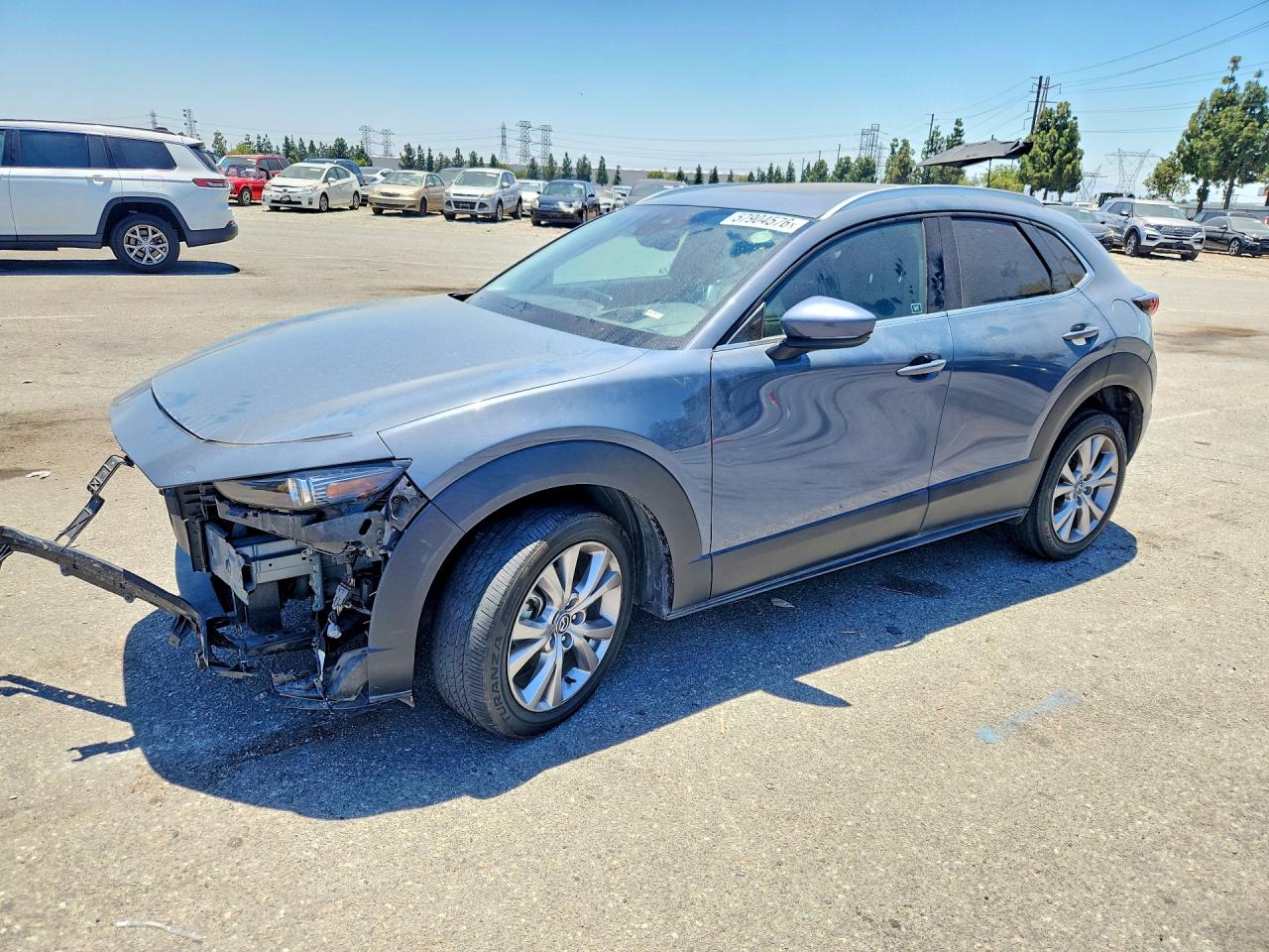 2021 Mazda CX-30 Premium, VIN 3MVDMBDL2MM319844 — Side