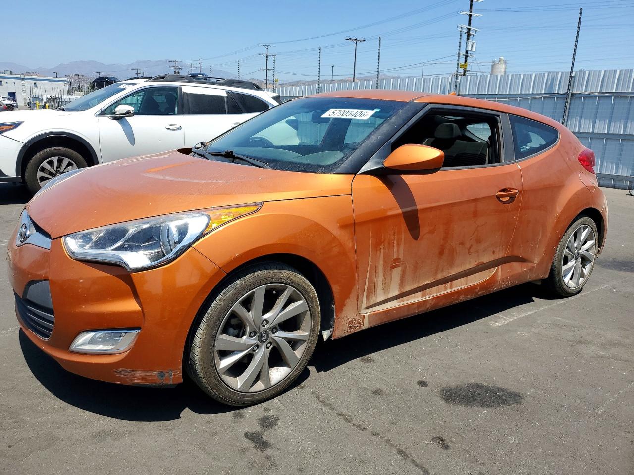 2017 Hyundai Veloster Value Edition, VIN KMHTC6AD0HU306303 — Vandalism
