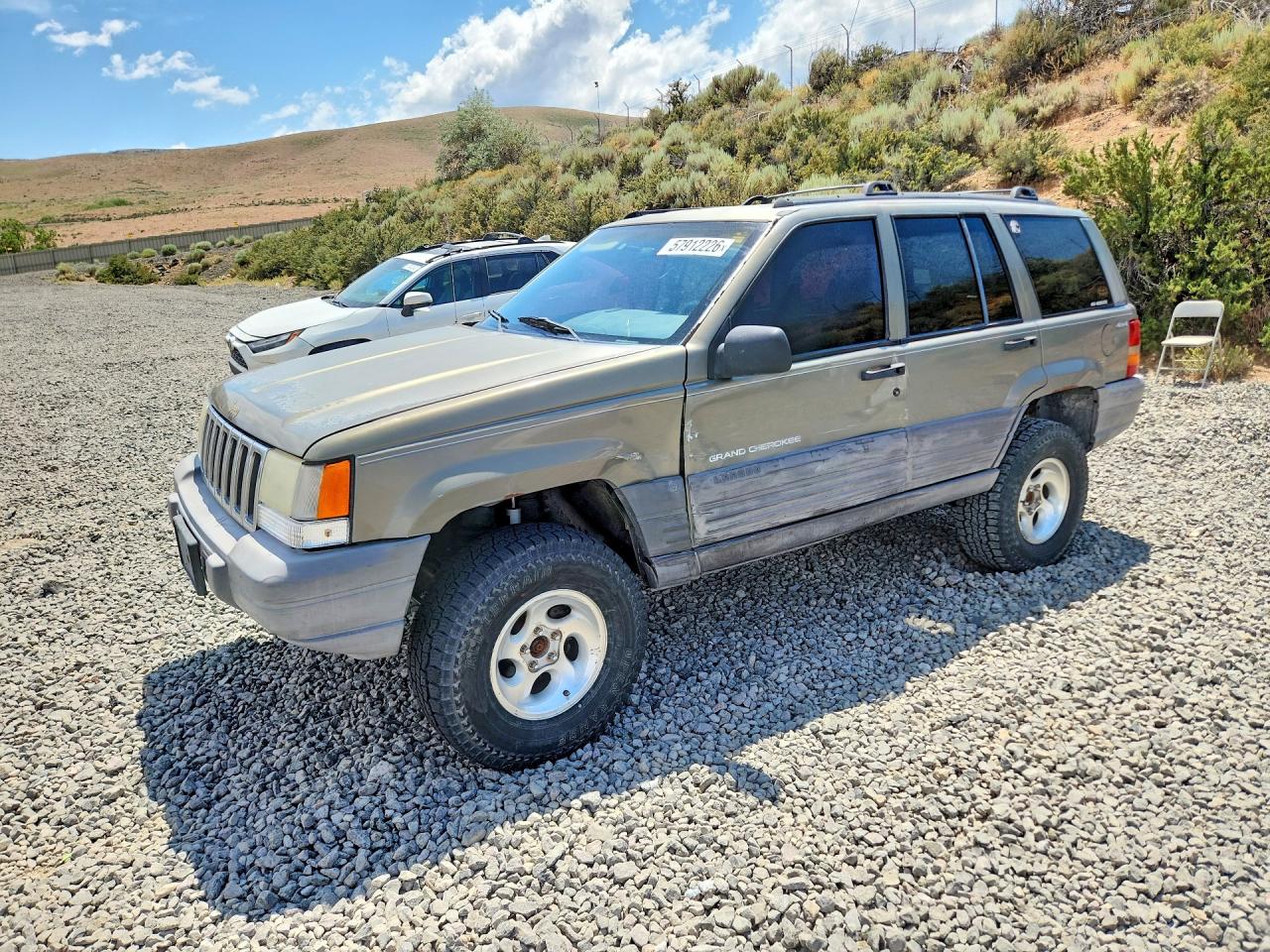 1998 Jeep Grand Cherokee Laredo, VIN 1J4GZ58S0WC351256 — Side