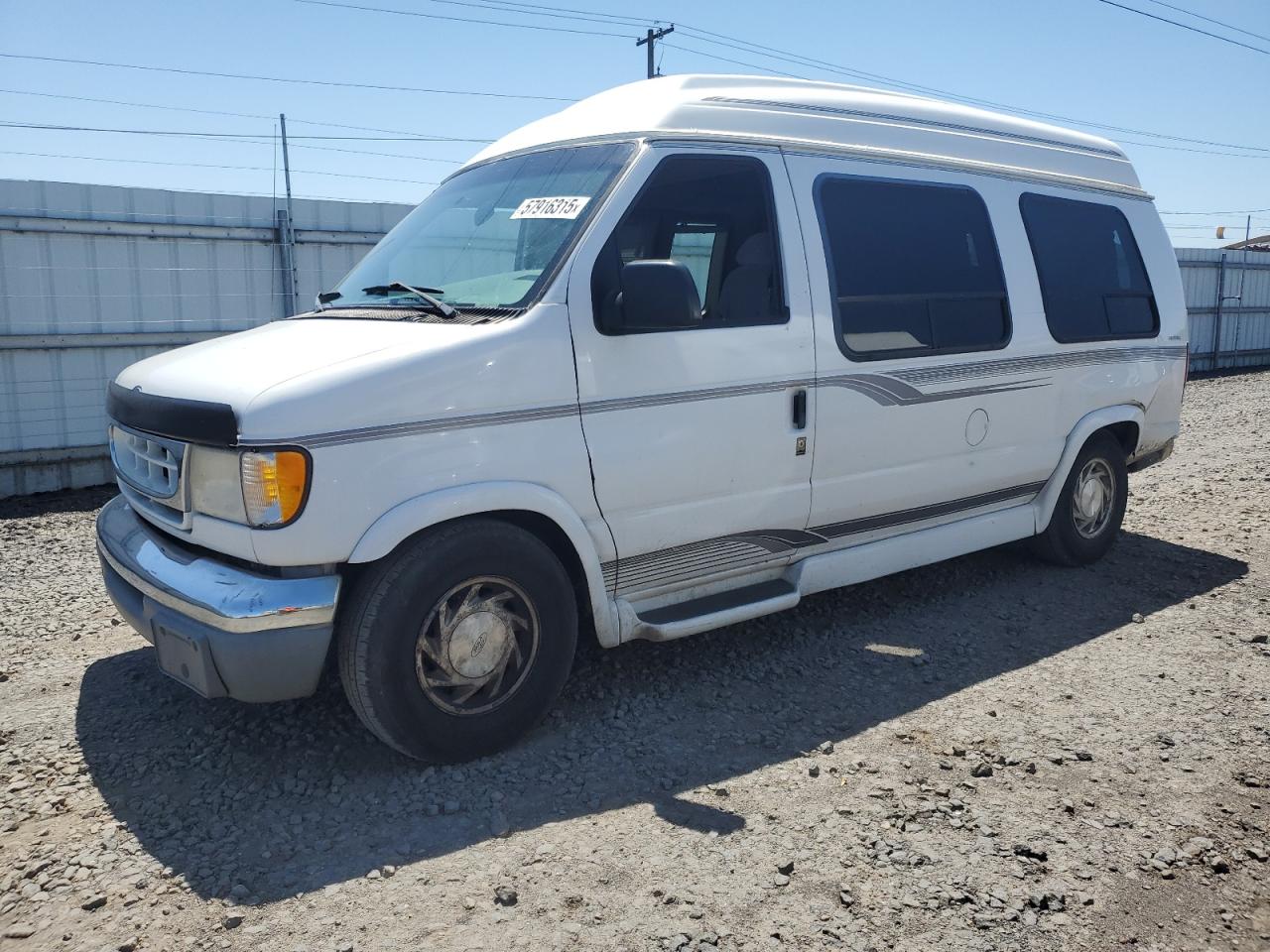 1999 Ford Econoline Cargo, VIN 1FDRE14WXXHB10462 — Rear end