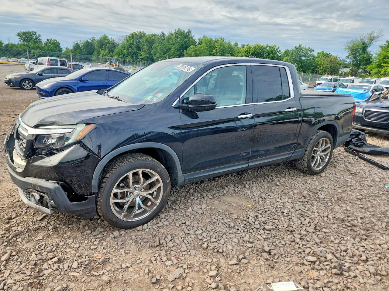 2020 Honda Ridgeline RTL-E, VIN 5FPYK3F70LB006686 — Front end