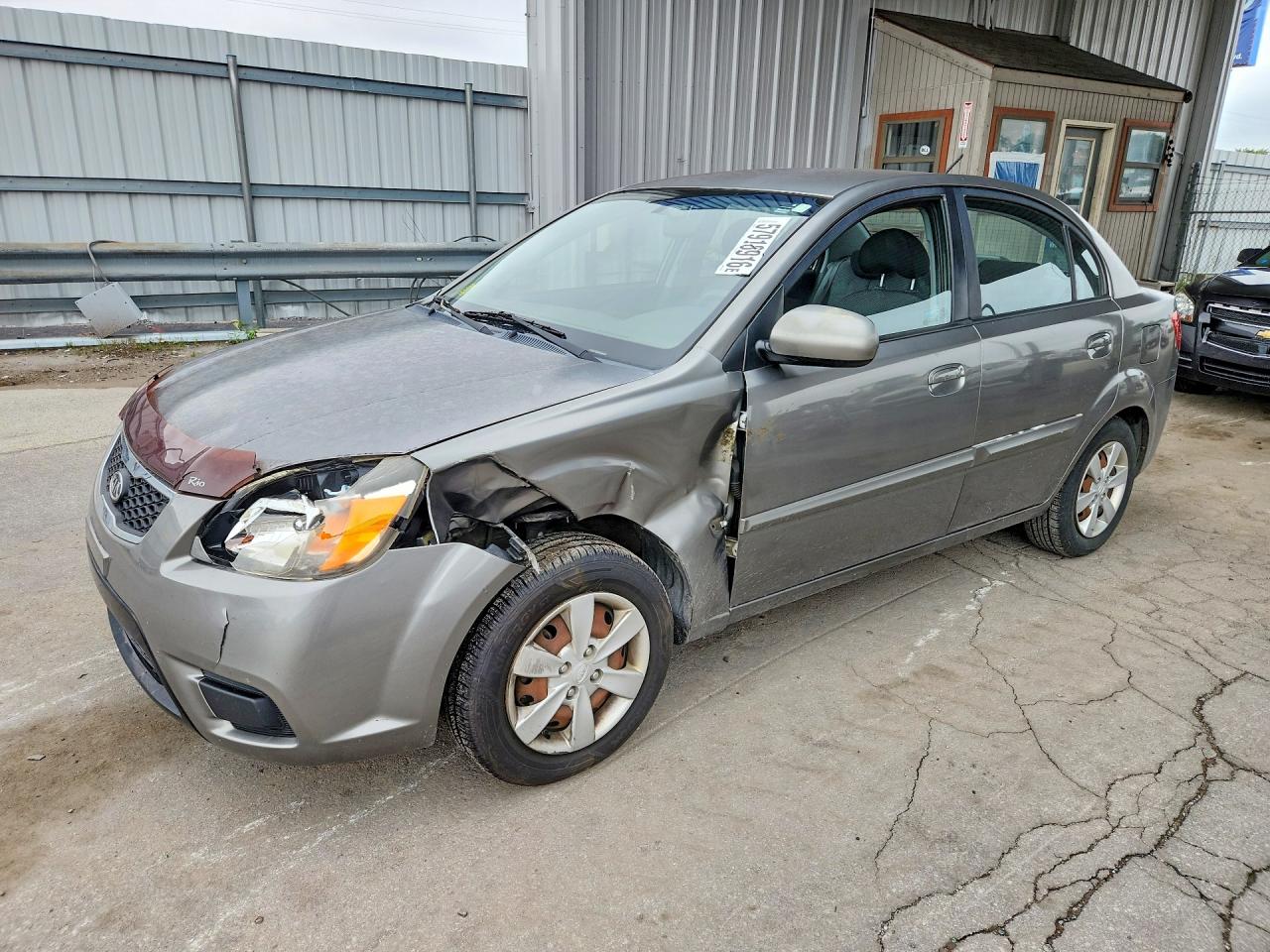 2011 Kia Rio LX, VIN KNADH4A32B6950688 — Перед